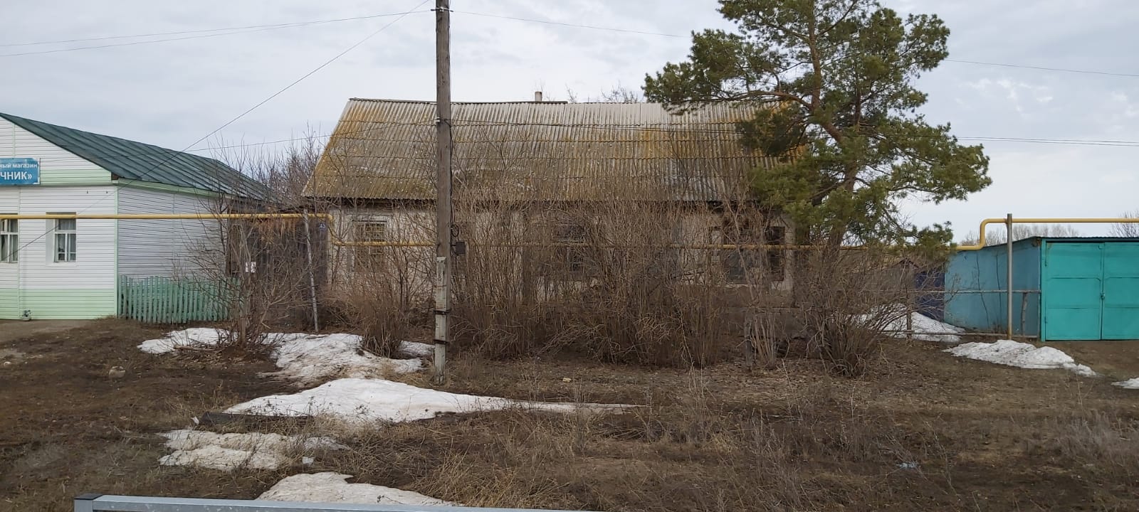 Комплекс имущества местоположение: обл. Оренбургская, р-н Тюльганский, с. Разномойка, ул. Советская, дом 43: 1. Земельный участок пл. 245 +/- 11 кв. м.; 2. Здание (Отделение почтовой связи) пл. 71.2 кв.м.